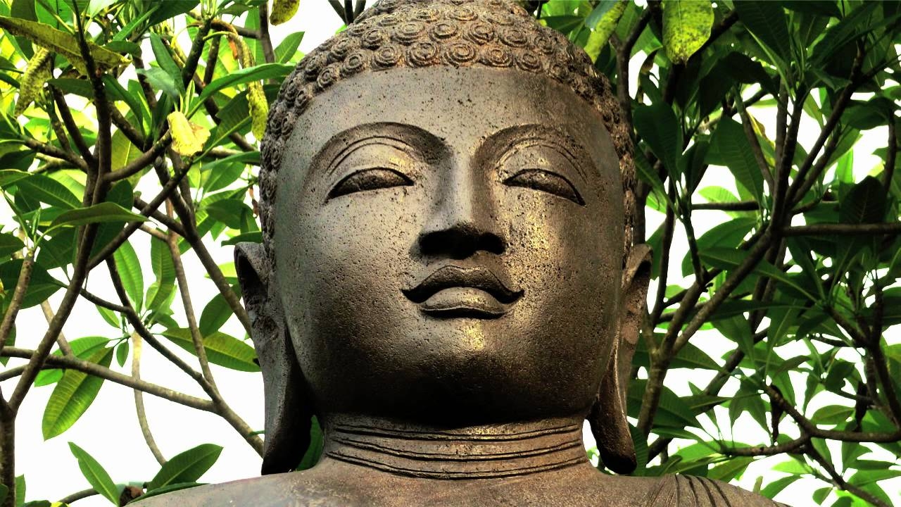 Полуулыбка Будды